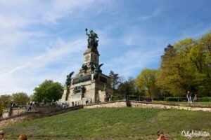 Exploring the Romantic Rhein Route in Germany | Niederdenkmal Monument | Rhein Ring Ticket | Rheingau Wineries | Wineries in the Rheingau to Visit | Rhein Wine | Rhein Wineries to Visit | Town to Visit along the Rhein River | Romantic Rhine Valley Travel | Vineyards along the Rhein River | Castles on the Rhein River | Things to do in Germany | Best of Germany to Visit | Things to do on the Rhein River | Wine Tasting on the Rhein - California Globetrotter